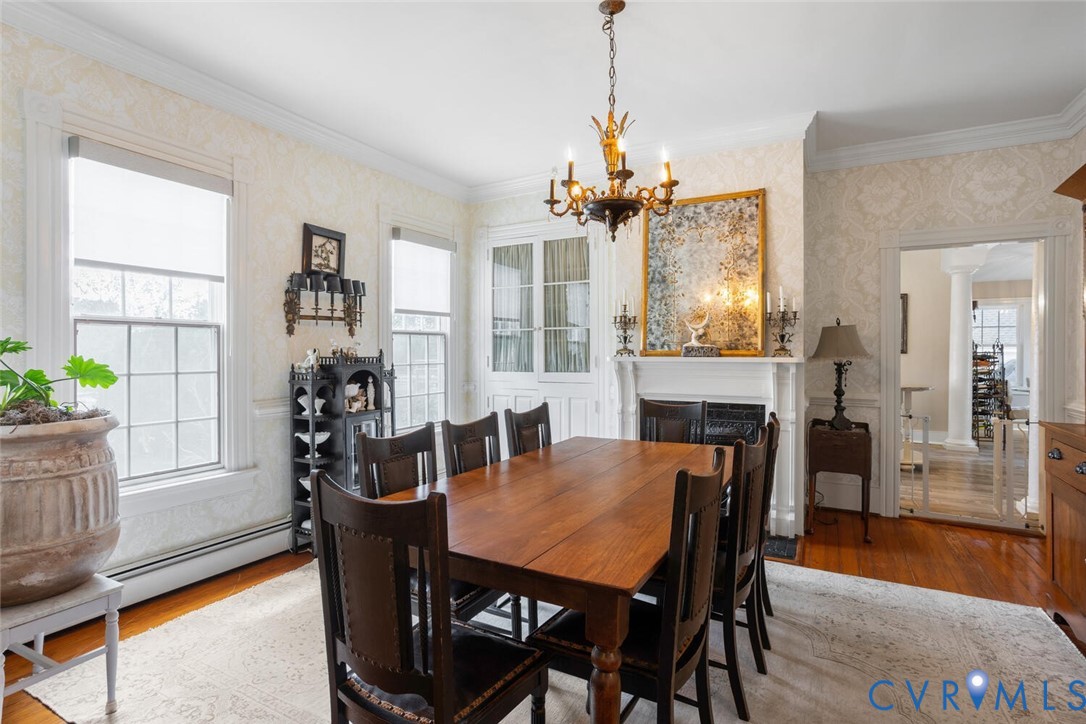 516 Mt Hermon Road Midlothian, VA 23112 - Photo 19 of 50 a view of a dining room with furniture window and wooden floor
