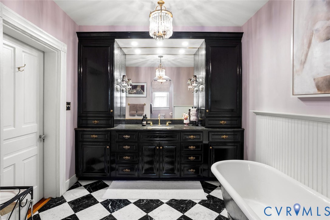 516 Mt Hermon Road Midlothian, VA 23112 - Photo 25 of 50 a bathroom with a granite countertop sink a mirror and a bathtub