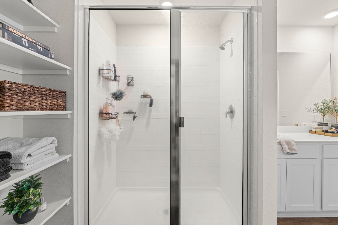 11817 Rush Lane Elgin, TX 78621 - Photo 16 of 30 a bathroom with a shower