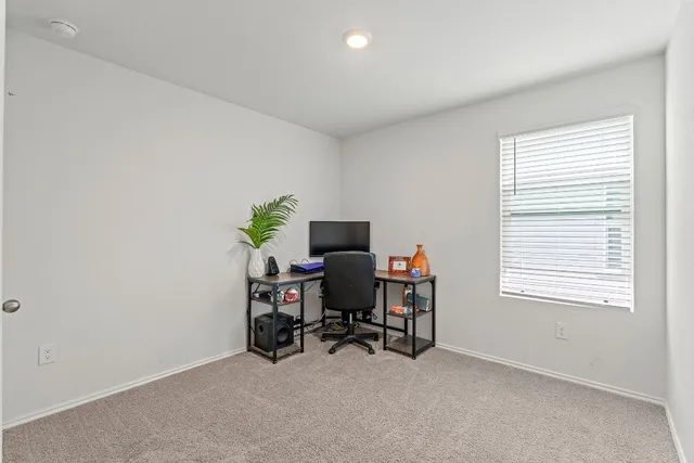 a en suite bathroom with a toilet sink and shower