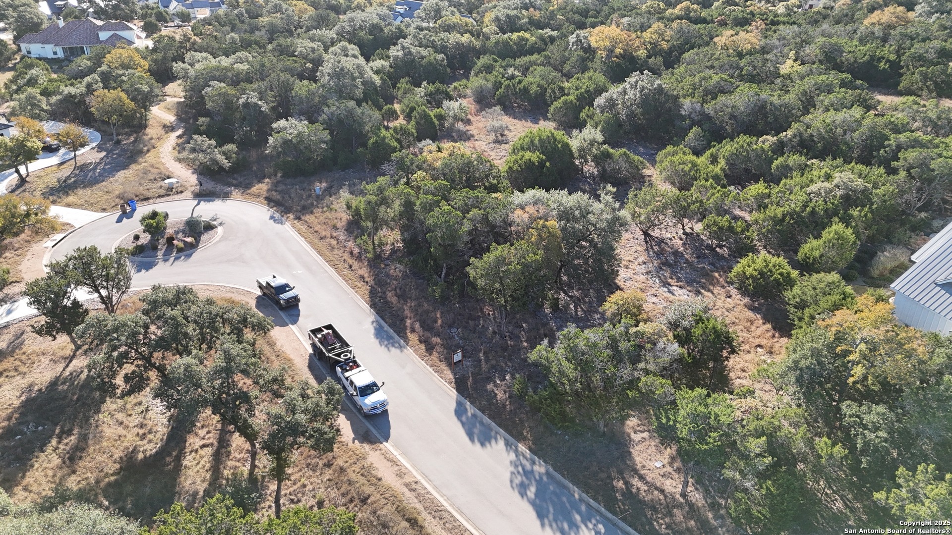 69 Ledgestone Place Boerne, TX 78006 - Photo 8 of 8 a view of a house with a yard