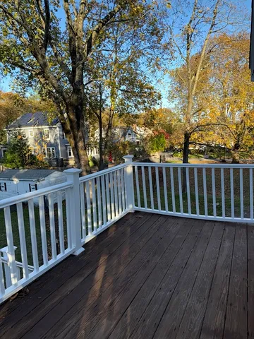 a view of a wooden roof deck
