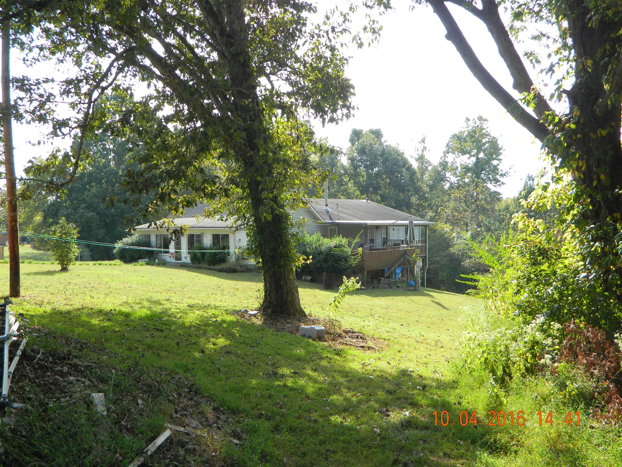 1706 Neptune Road Ashland City, TN 37015 - Photo 17 of 17 Side View of house with Deck and Hot Tub