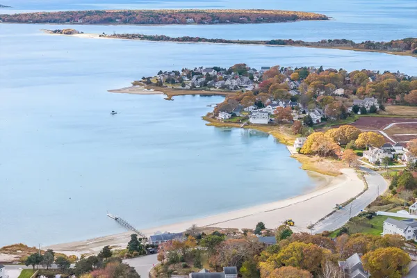 a view of a balcony with two chairs