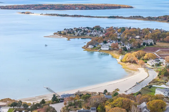 a view of a balcony with two chairs