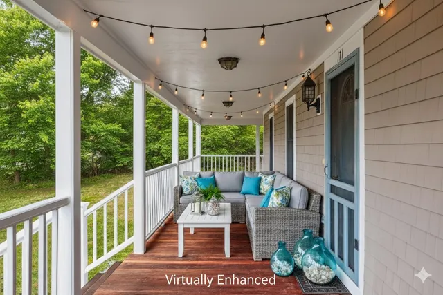 an empty room with a ceiling fan and windows