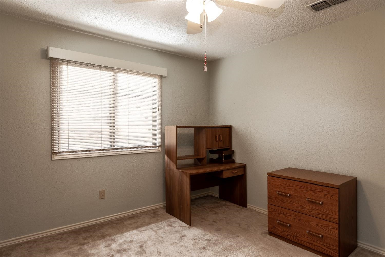 4424 76th Street Lubbock, TX 79424 - Photo 21 of 27 a view of workspace with a window