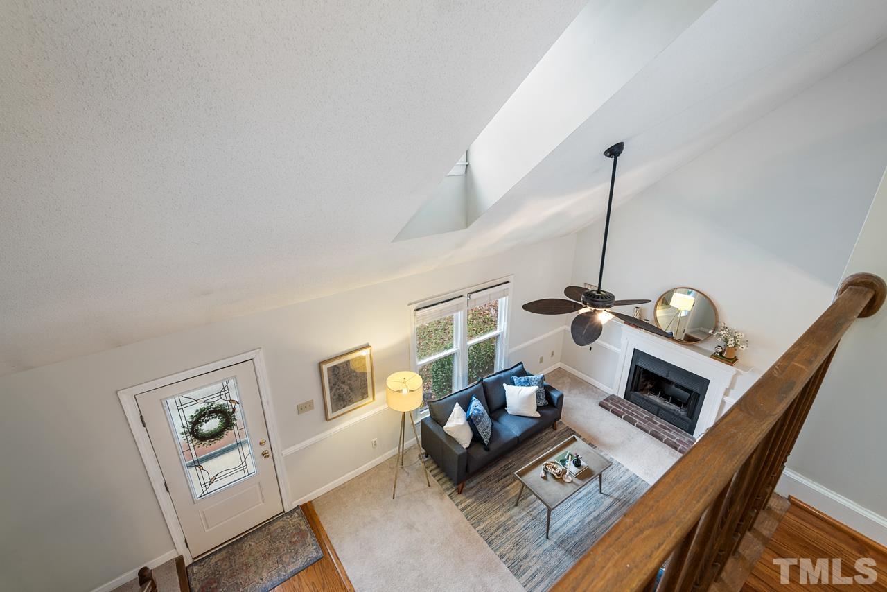 4109 Settlement Drive Durham, NC 27713 - Photo 20 of 31 a living room with furniture and a wooden floor