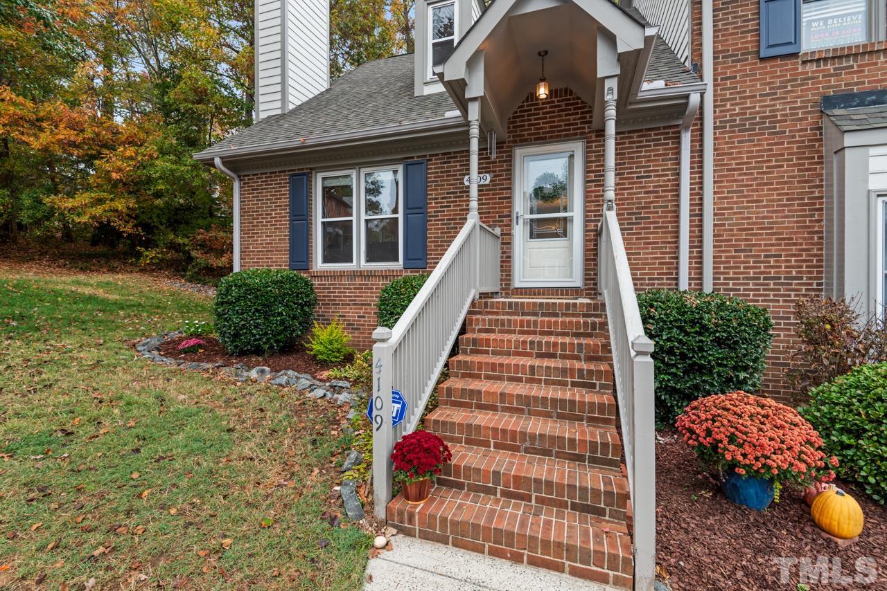 4109 Settlement Drive Durham, NC 27713 - Photo 2 of 31 a front view of a house with a yard