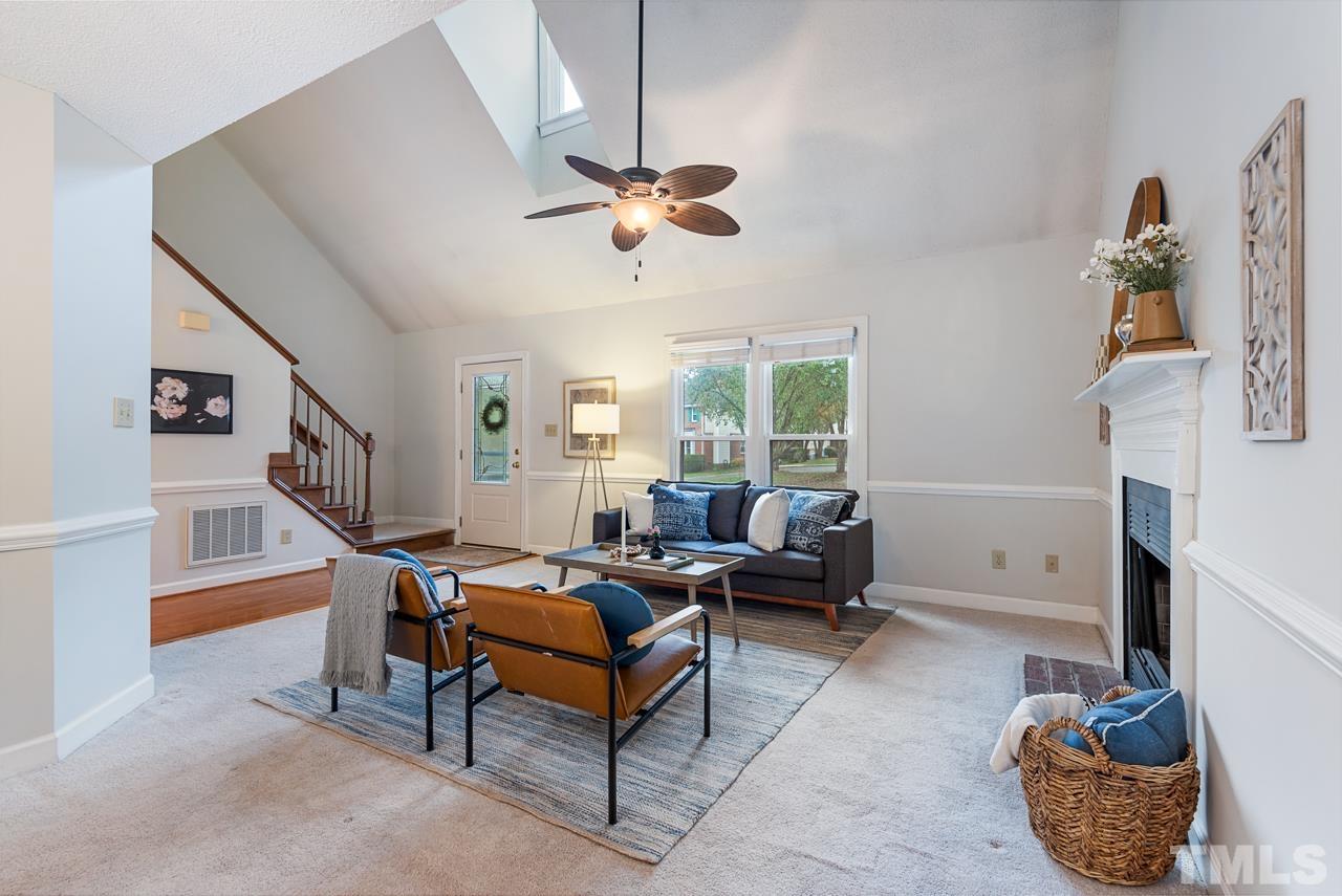 4109 Settlement Drive Durham, NC 27713 - Photo 3 of 31 a living room with furniture fireplace and a window