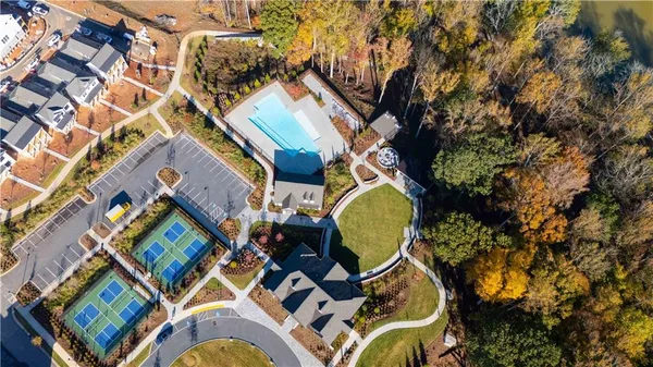 a aerial view of a swimming pool patio and outdoor seating