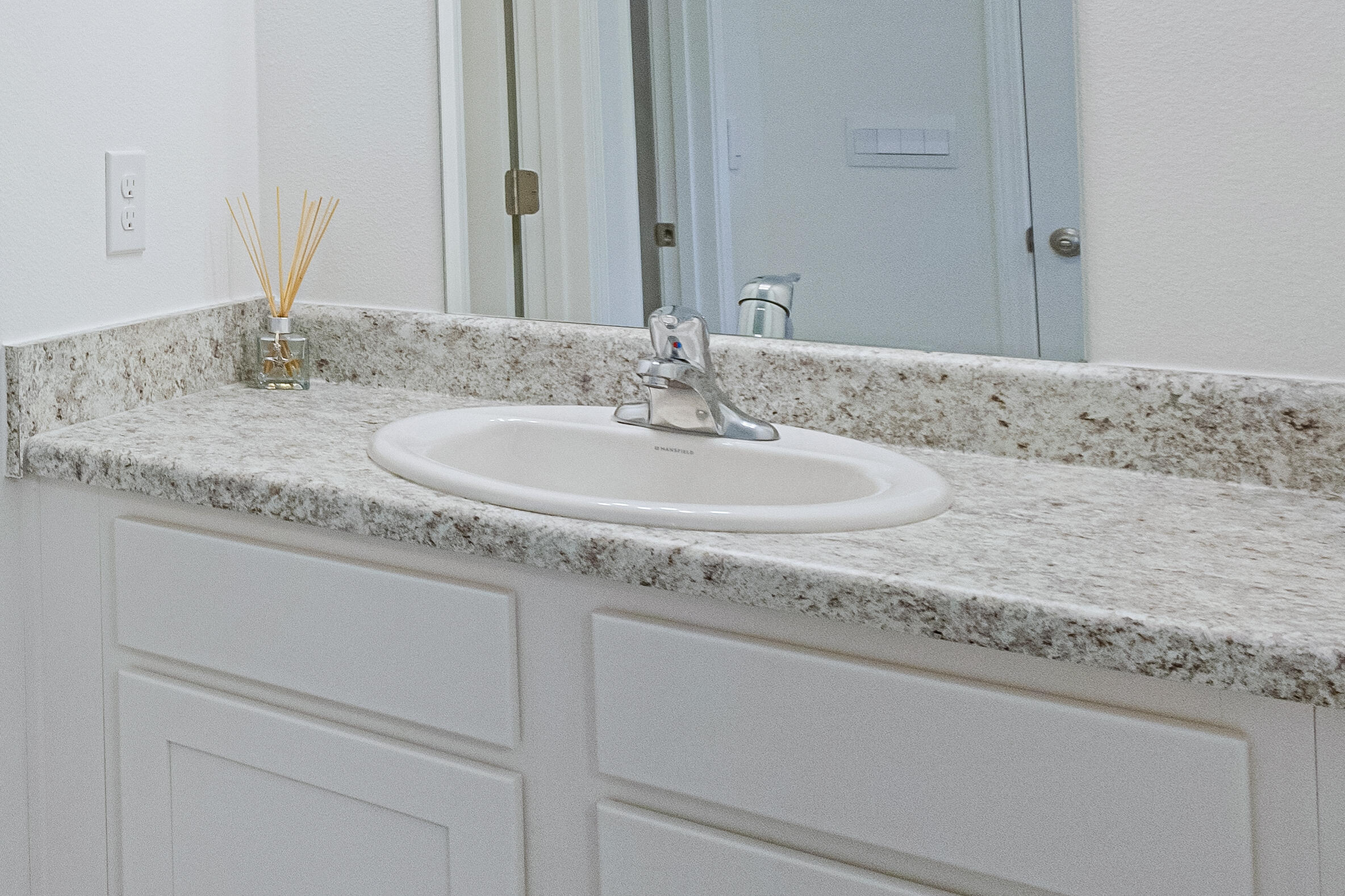 16 Woodsorrel Street Freeport, FL 32439 - Photo 12 of 23 a bathroom with a sink and a mirror