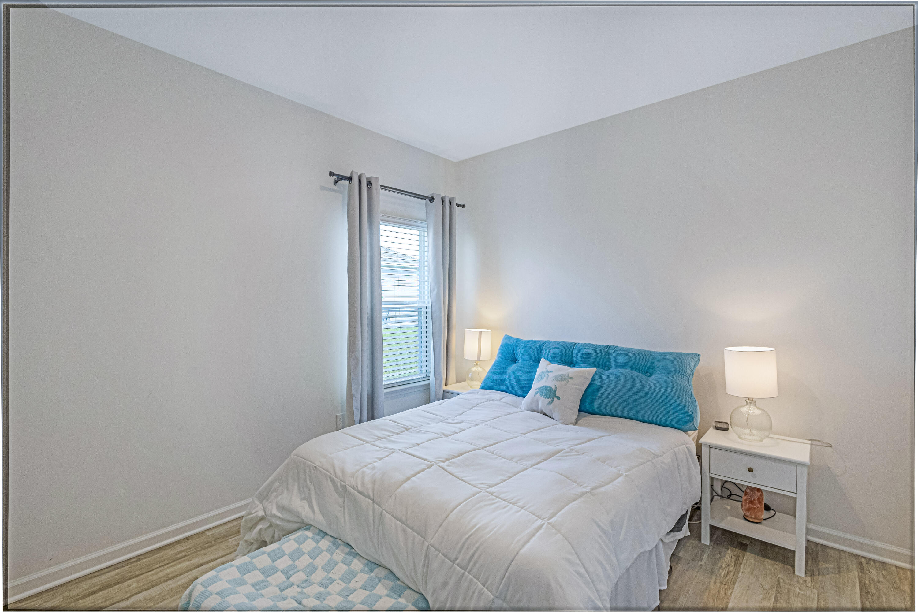 16 Woodsorrel Street Freeport, FL 32439 - Photo 17 of 23 a bedroom with a bed and a window