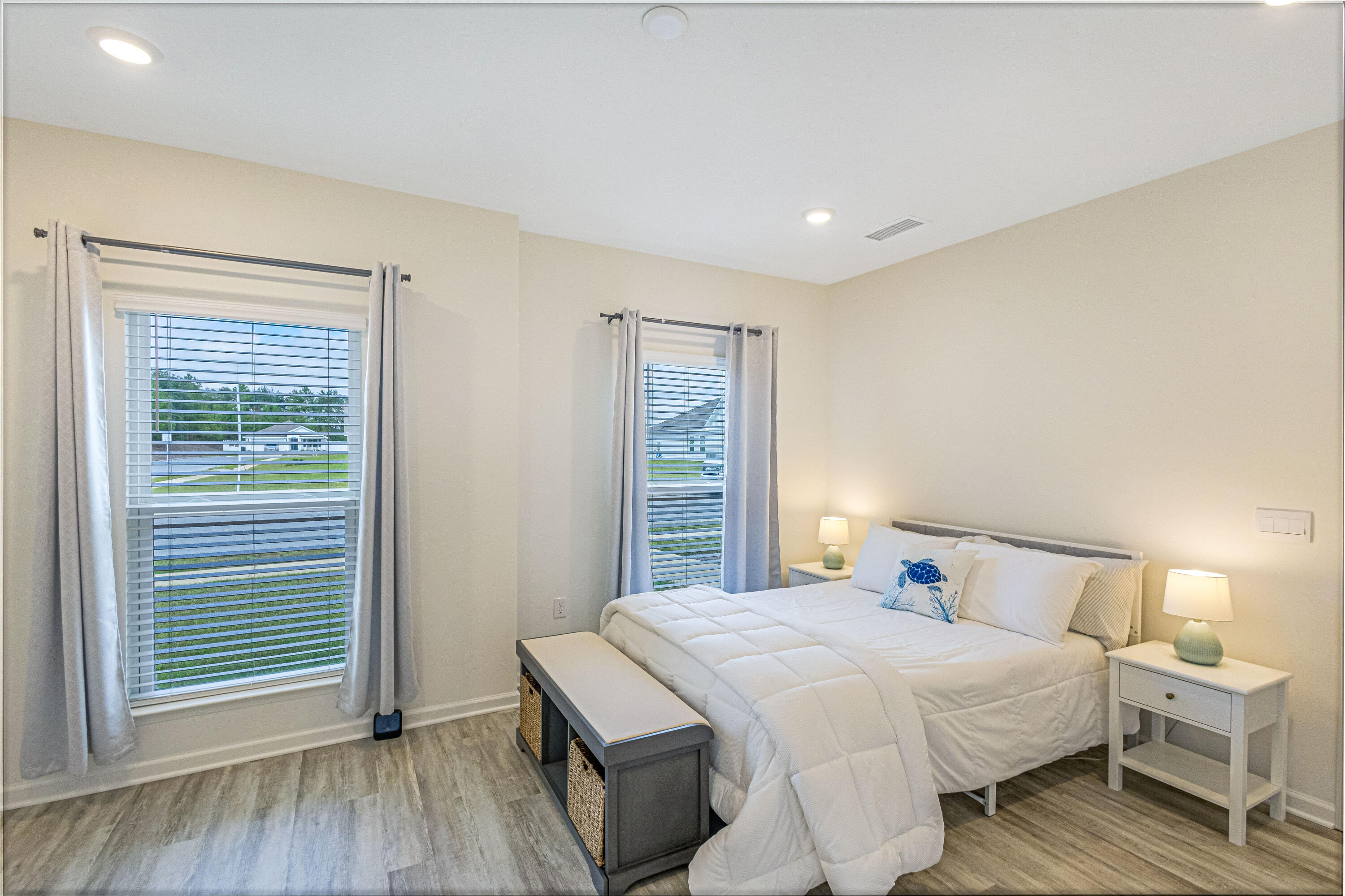 16 Woodsorrel Street Freeport, FL 32439 - Photo 9 of 23 a bedroom with a bed and a window