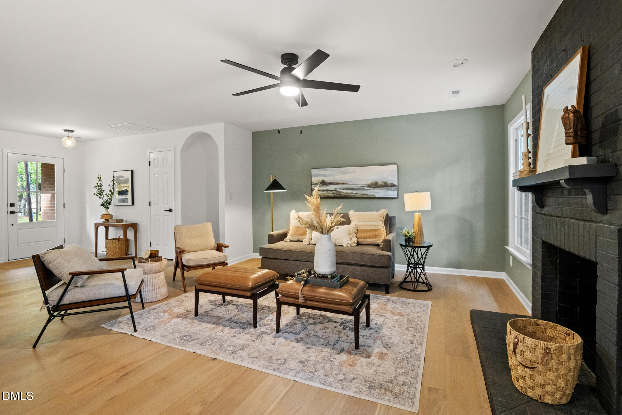 3509 Morningside Drive Raleigh, NC 27607 - Photo 5 of 49 a living room with furniture and a fireplace