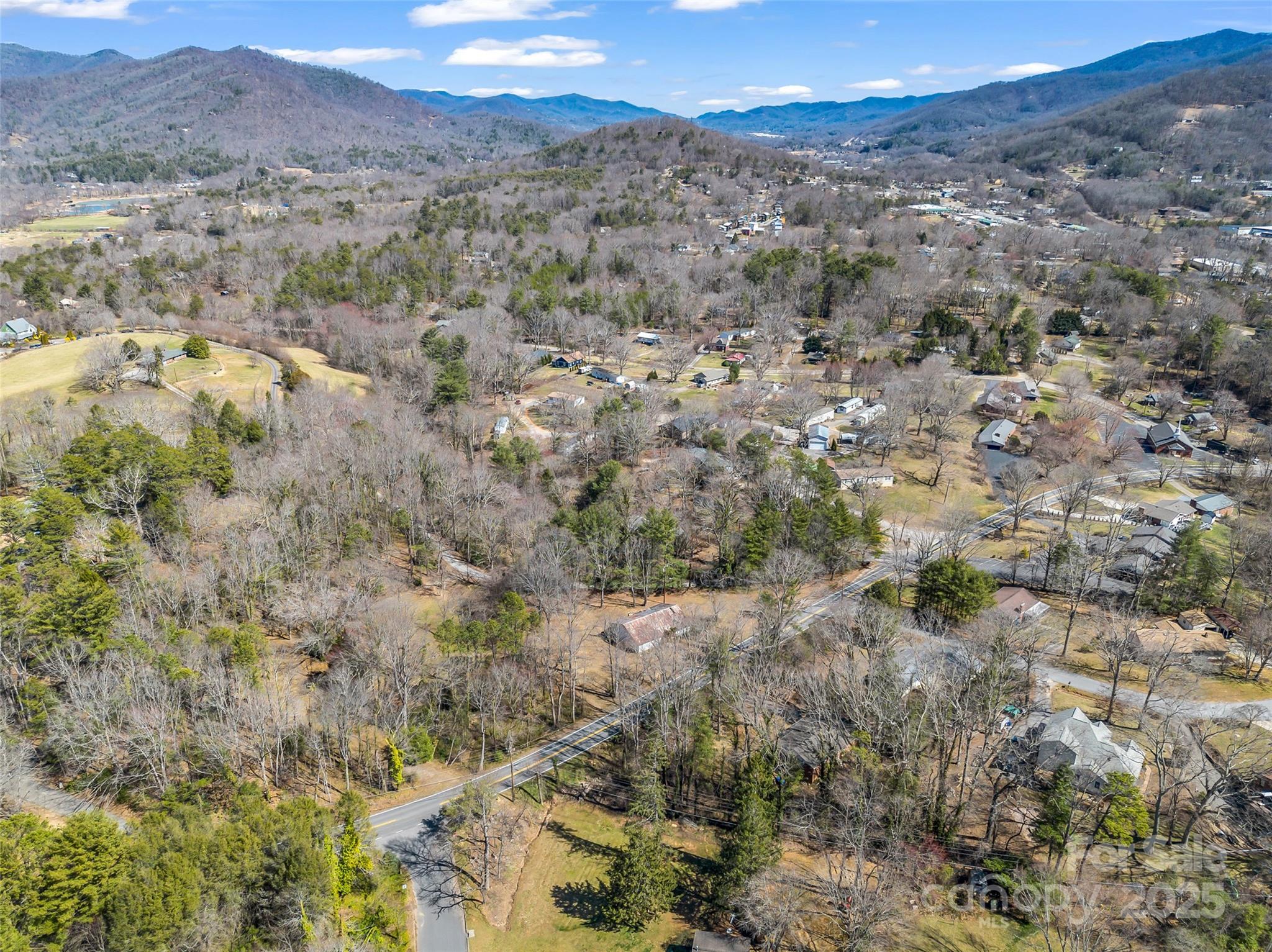 156 Warren Wilson Road Swannanoa, NC 28778 - Photo 21 of 38 a view of a city with mountains in the background