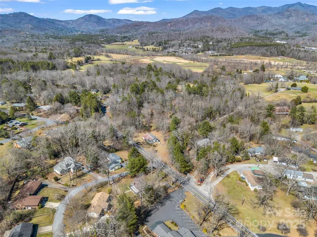 an aerial view of residential house and outdoor space