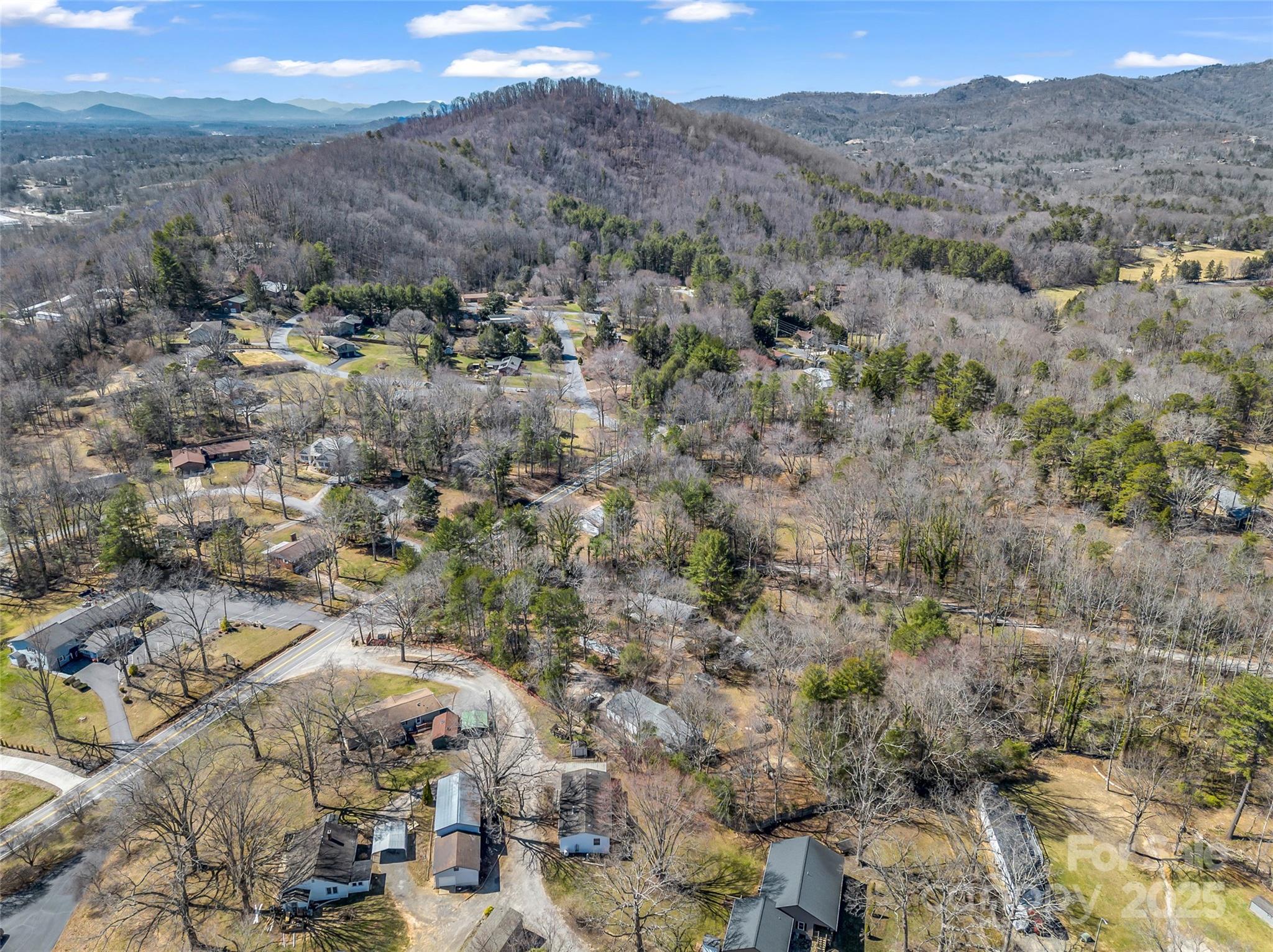 156 Warren Wilson Road Swannanoa, NC 28778 - Photo 26 of 38 a view of a houses with a yard