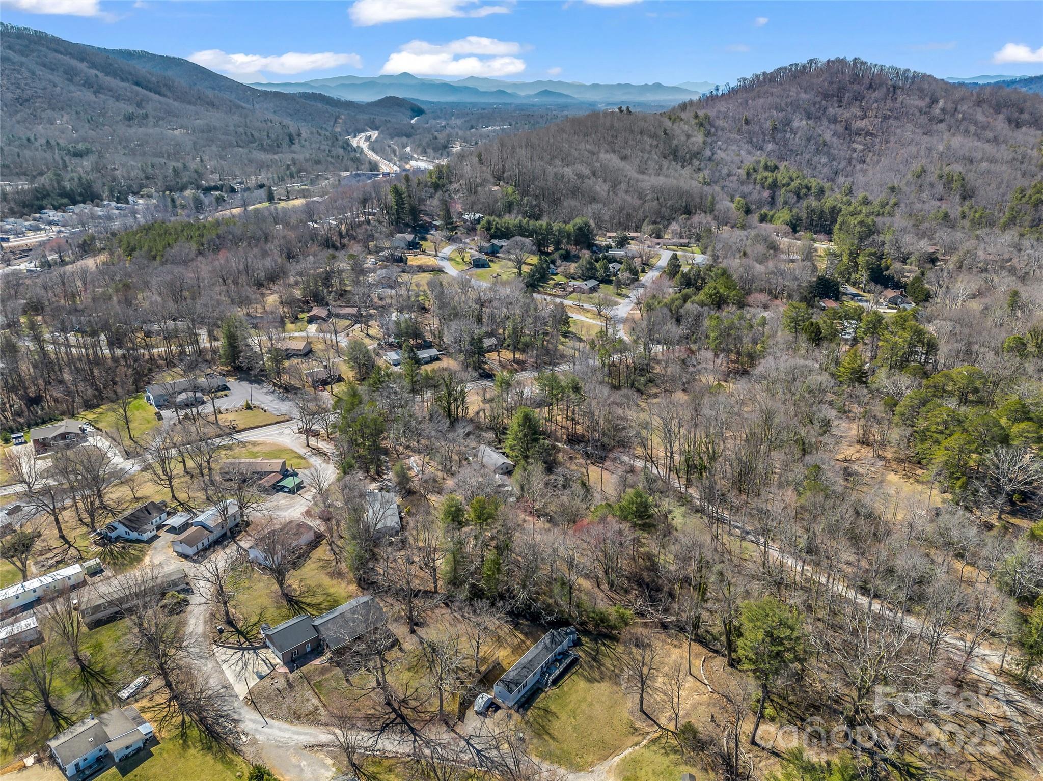 156 Warren Wilson Road Swannanoa, NC 28778 - Photo 27 of 38 a view of a city with mountains in the background