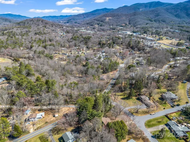 a view of a city with mountains in the background