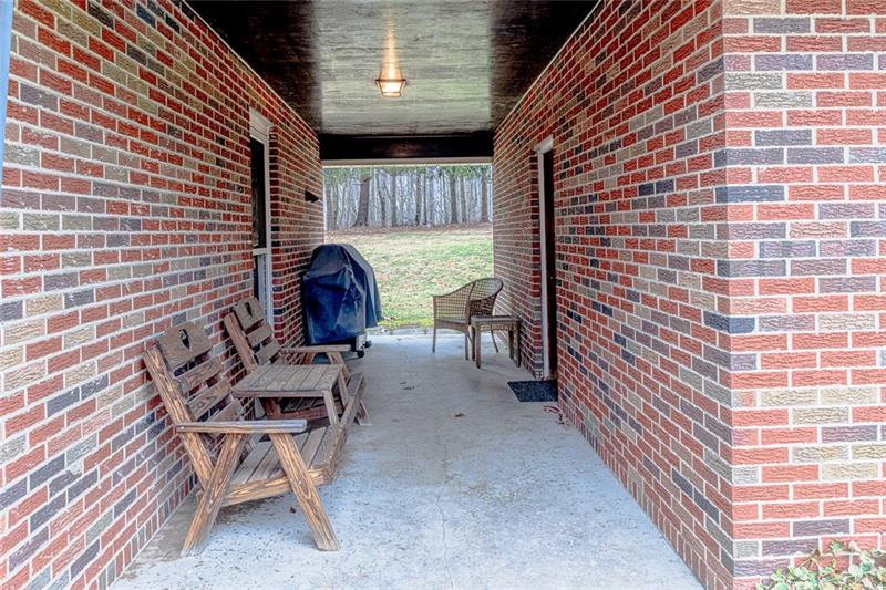 165 Old Glade Mill Road Valencia, PA 16059 - Photo 21 of 23 Kitchen opens to covered breezeway perfect for enjoying summer evenings