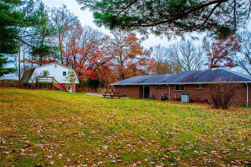 165 Old Glade Mill Road Valencia, PA 16059 - Photo 4 of 23 Level spacious backyard with plenty of room for play set