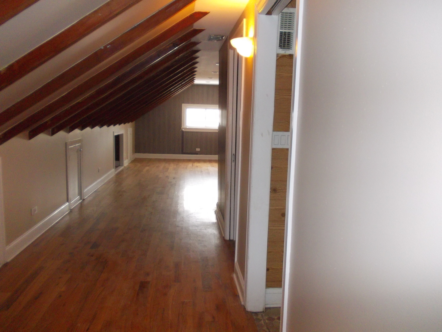 4145 Eberly Avenue Brookfield, IL 60513 - Photo 8 of 13 a view of hallway with wooden floor