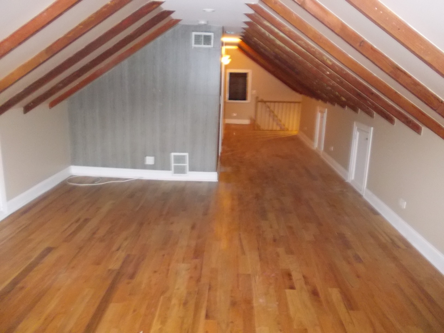4145 Eberly Avenue Brookfield, IL 60513 - Photo 9 of 13 a view of a hallway with wooden floor