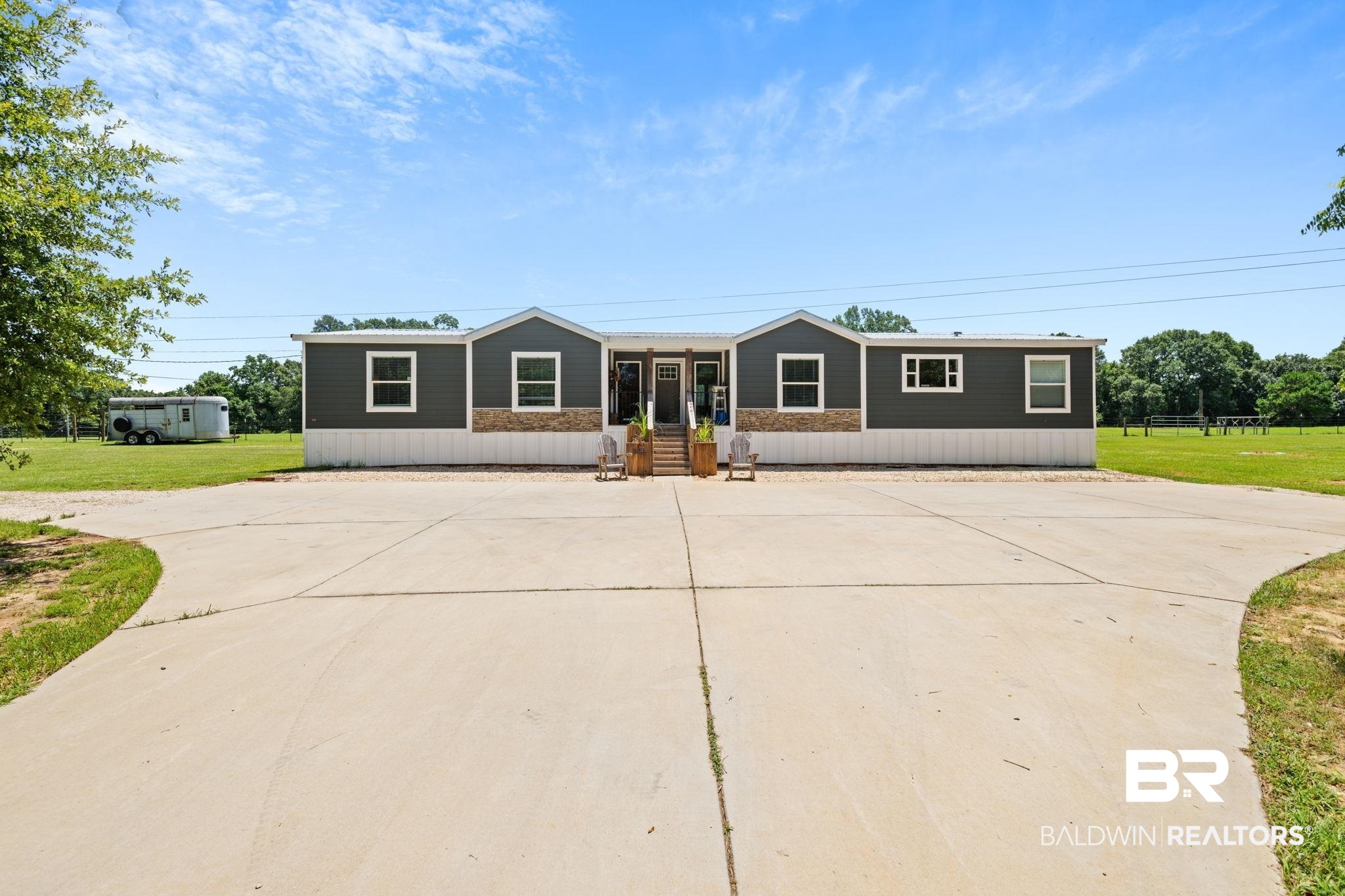 10703 South Ridge Drive Semmes, AL 36575 - Photo 8 of 37 Manufactured / mobile home with concrete driveway and a front lawn