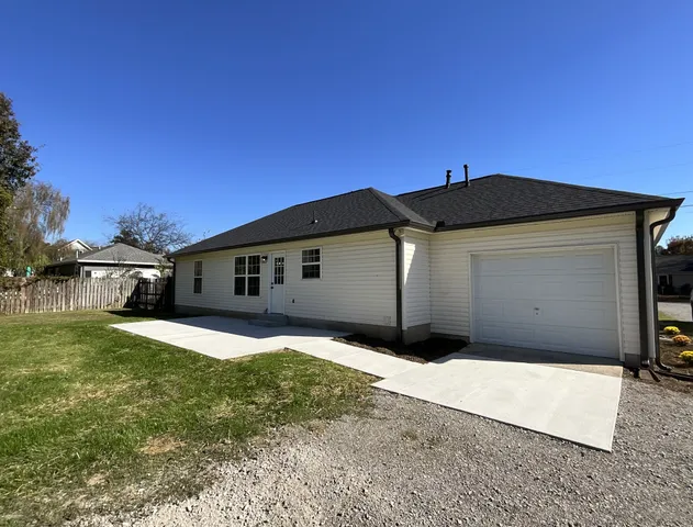 a view of a back yard of the house
