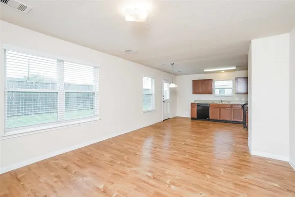 a view of an empty room and window