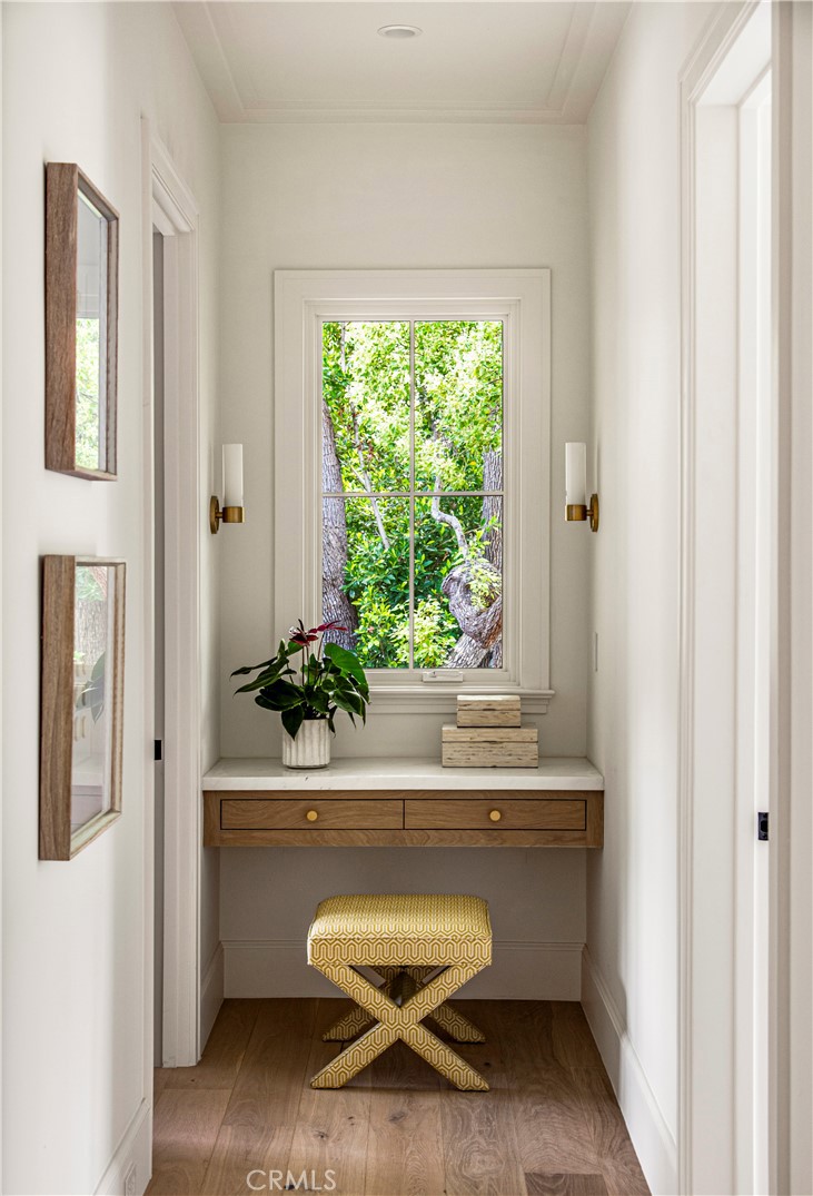a living room with a sink and a window