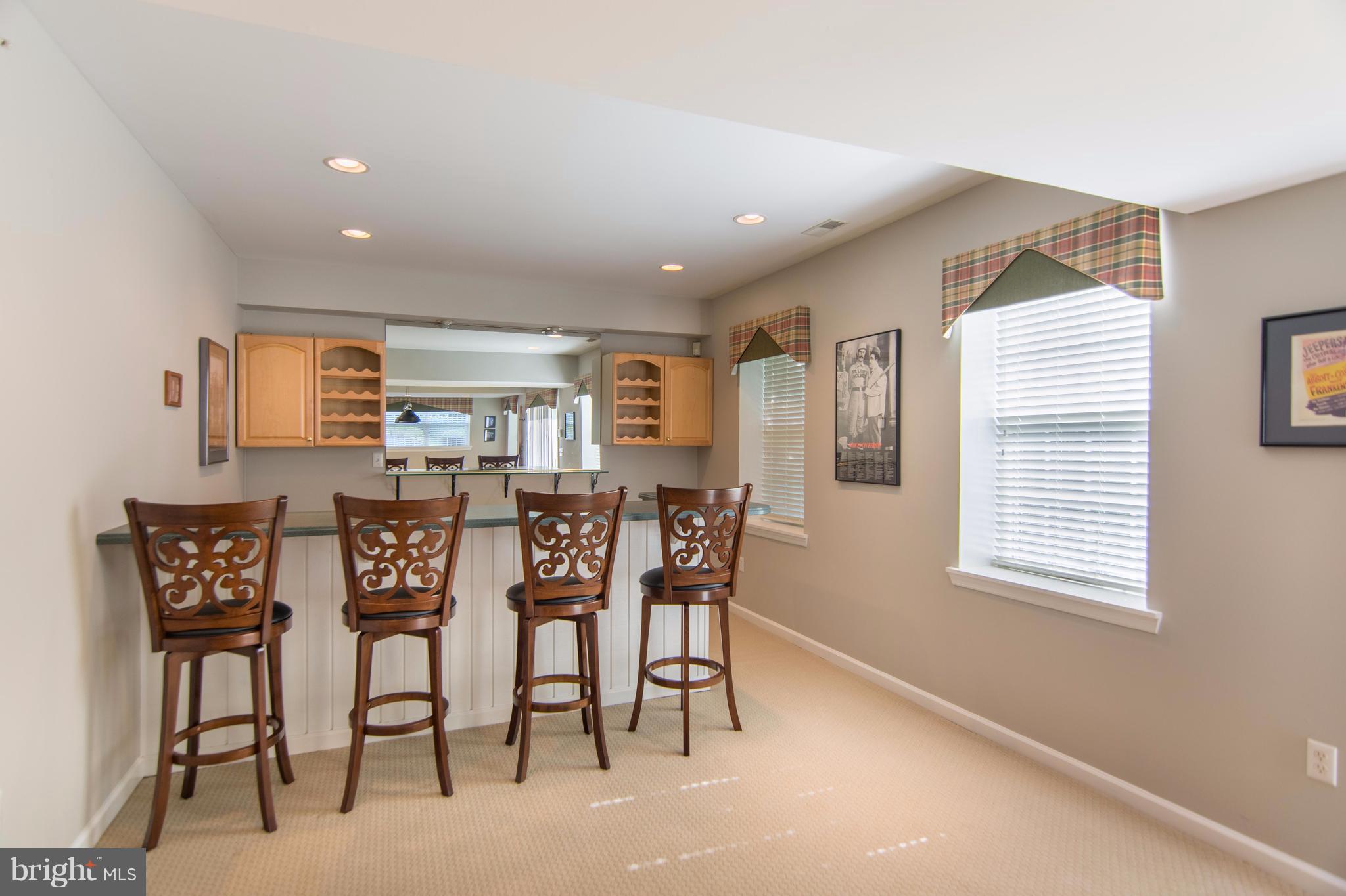 1569 Comanche Road Arnold, MD 21012 - Photo 18 of 22 Bar area with fridge