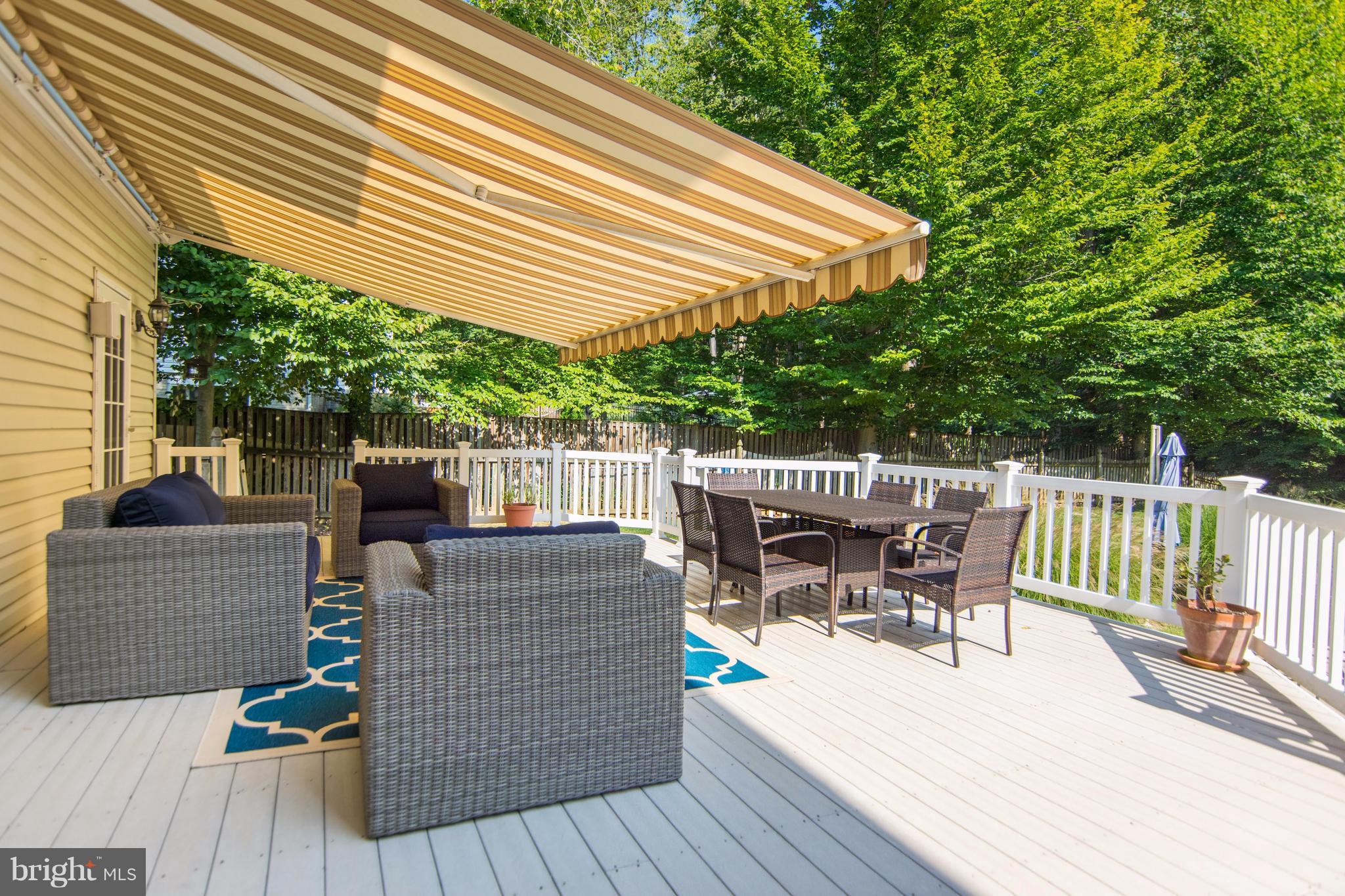 1569 Comanche Road Arnold, MD 21012 - Photo 19 of 22 Large deck area with awning