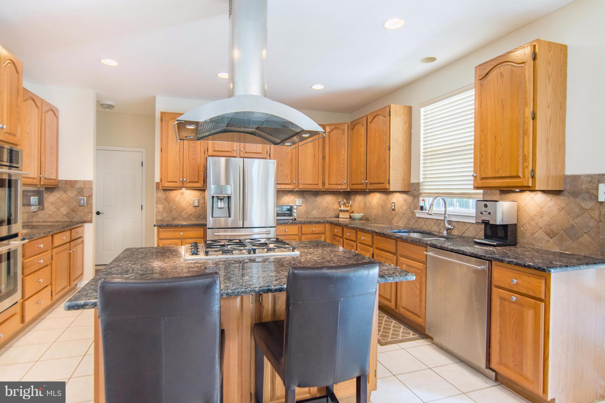 1569 Comanche Road Arnold, MD 21012 - Photo 5 of 22 Gourmet kitchen with granite and stainless