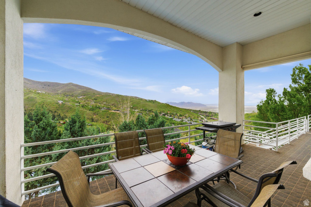 1878 East Ridge Point Drive Bountiful, UT 84010 - Photo 65 of 92 Balcony featuring outdoor dining area and a mountain view