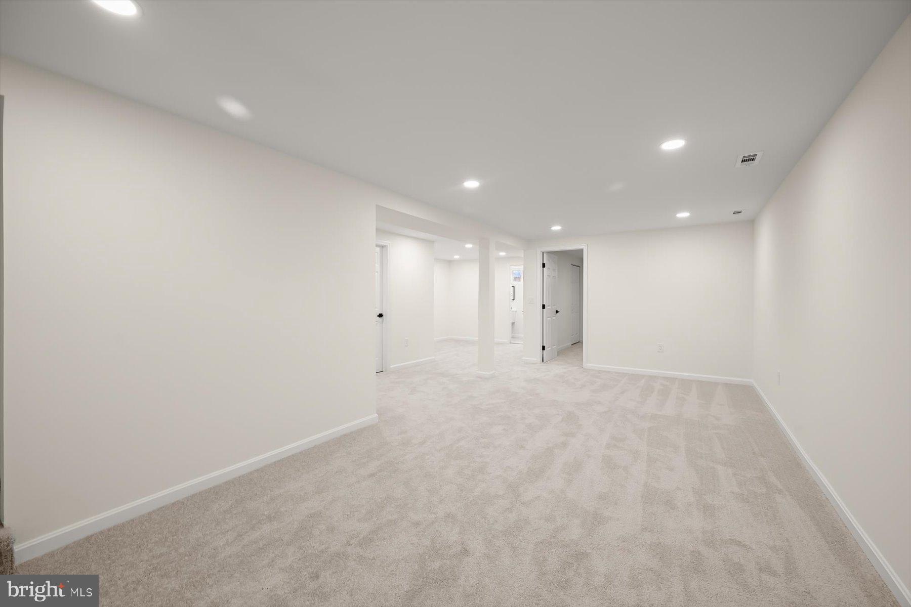 8475 Byrd Road Pasadena, MD 21122 - Photo 19 of 30 Rec area w/ new carpet