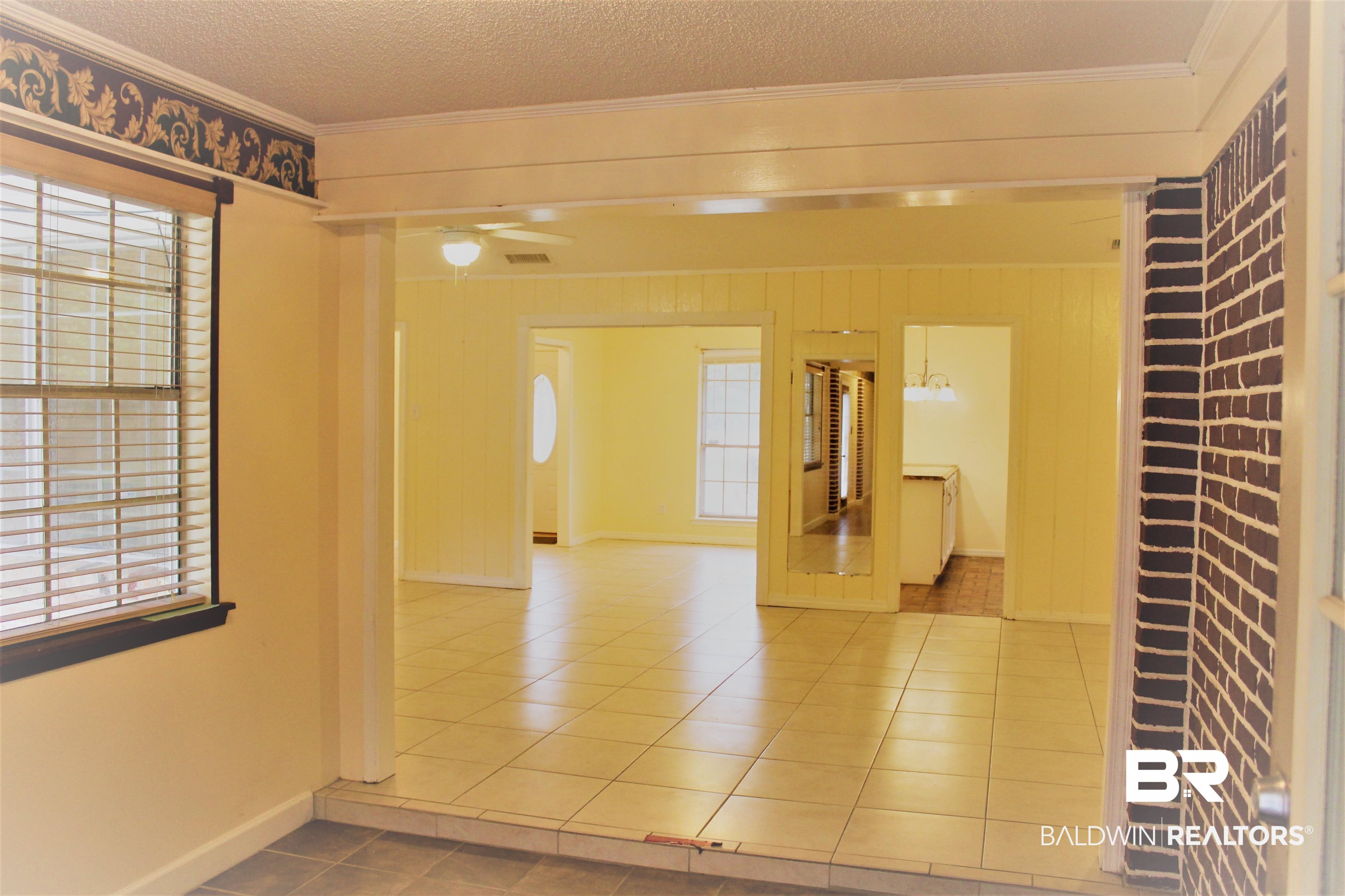 4251 Schillinger Road South Mobile, AL 36619 - Photo 6 of 38 Living room -main home; access to kitchen & MILs