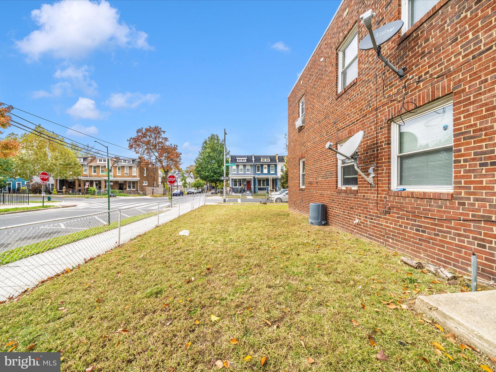 1208 Raum Street Northeast Washington, DC 20002 - Photo 11 of 15 a view of yellow house with outdoor space