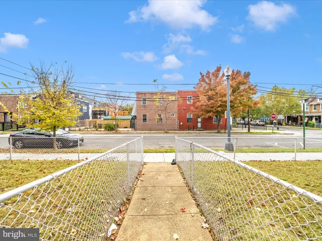 a swimming pool with outdoor seating and yard