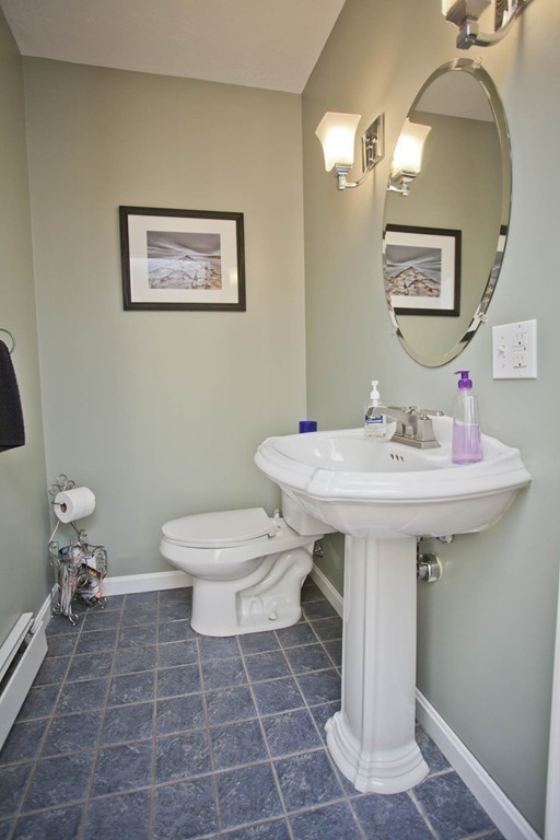 51 Crest Road Monson, MA 01057 - Photo 13 of 30 a bathroom with a sink a toilet and mirror
