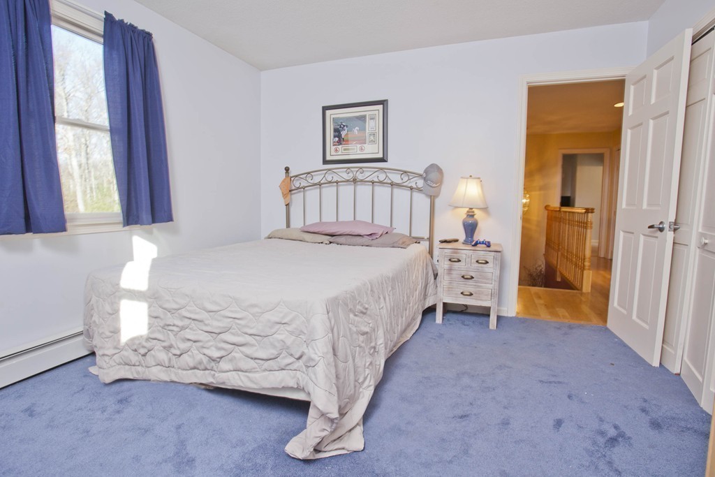 51 Crest Road Monson, MA 01057 - Photo 15 of 30 a bedroom with a bed and a window