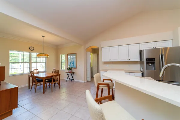 a view of a dining room with furniture