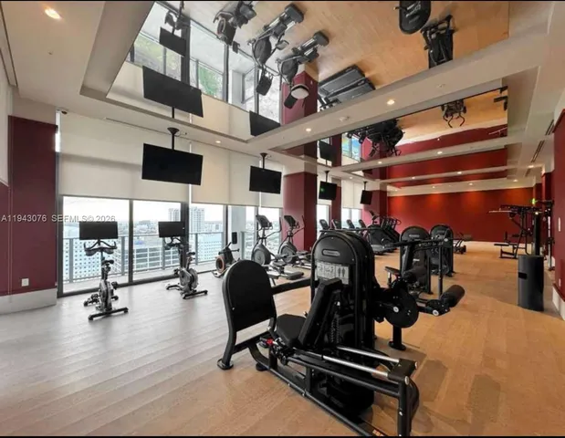 a view of a room with gym equipment