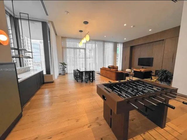 a kitchen with lots of counter top space and stainless steel appliances