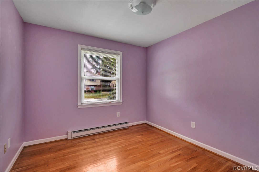 909 Jamestown Road Colonial Heights, VA 23834 - Photo 17 of 25 Bedroom with wood floor and a large closet.
