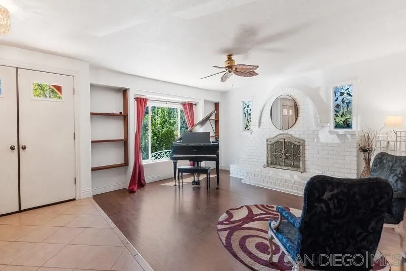14578 Rios Canyon Road El Cajon, CA 92021 - Photo 20 of 61 a living room with furniture and a large window