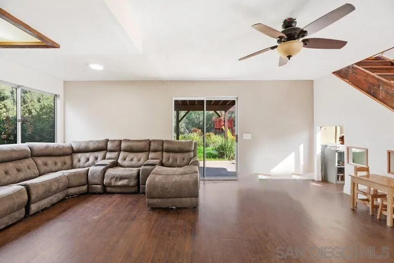 14578 Rios Canyon Road El Cajon, CA 92021 - Photo 23 of 61 a living room with furniture and a large window