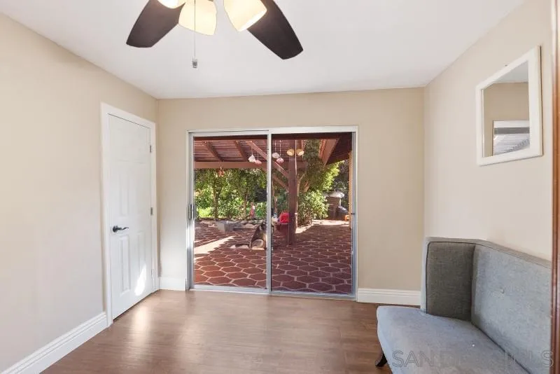 14578 Rios Canyon Road El Cajon, CA 92021 - Photo 29 of 61 a living room with furniture and a large window