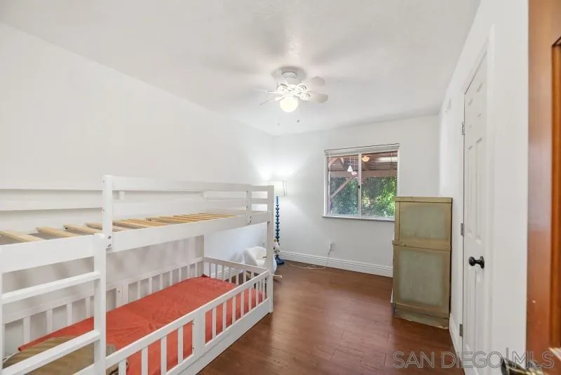 14578 Rios Canyon Road El Cajon, CA 92021 - Photo 37 of 61 a bedroom with a bed and a window